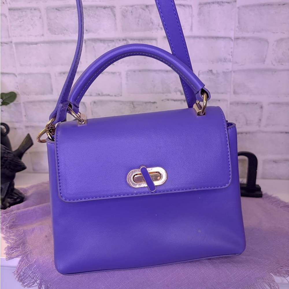 Vibrant Purple Mini Bag with Top-Handle and Turn-Lock Closure